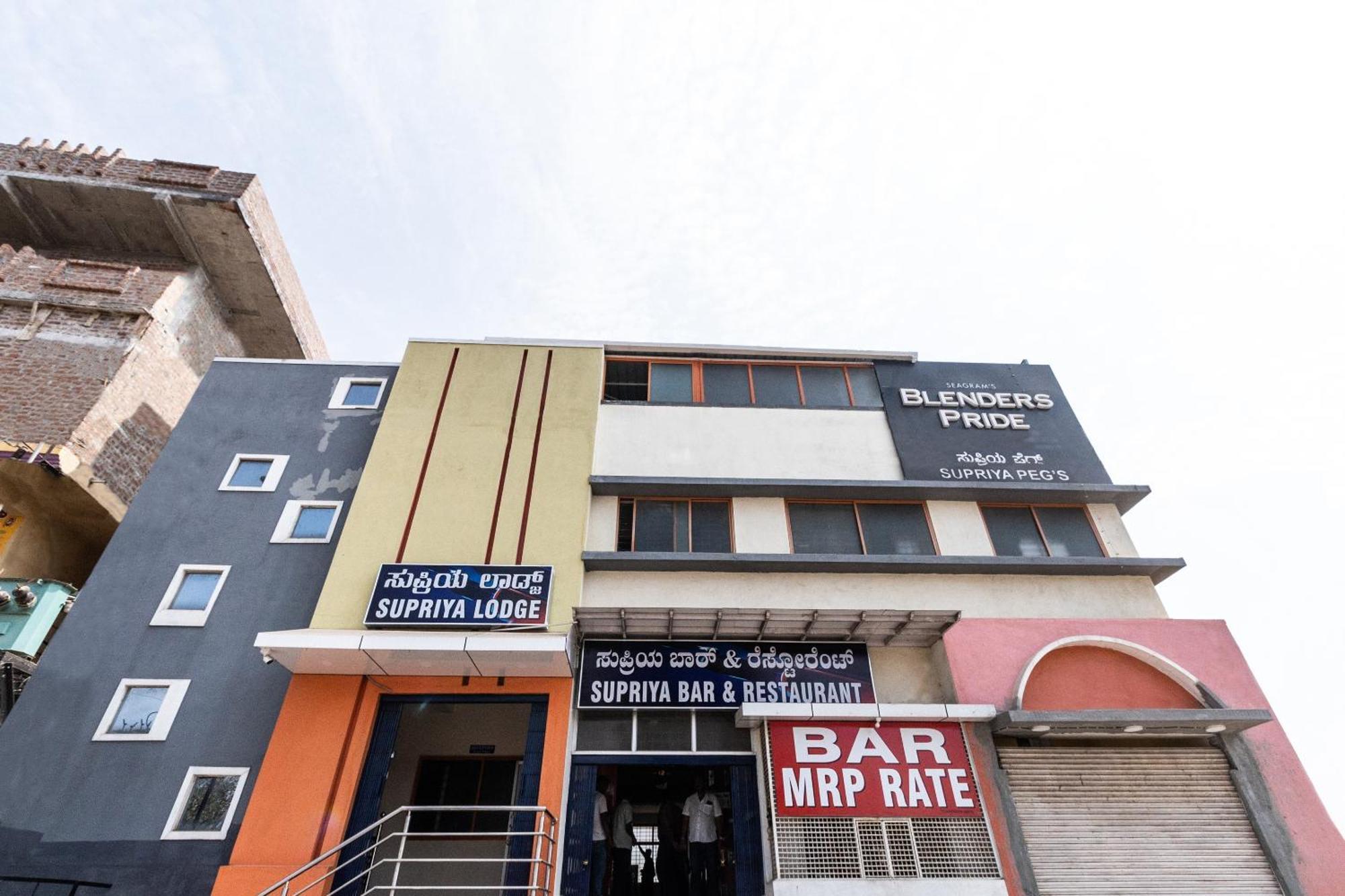 Hotel O Supriya Lodge Hasszan Kültér fotó